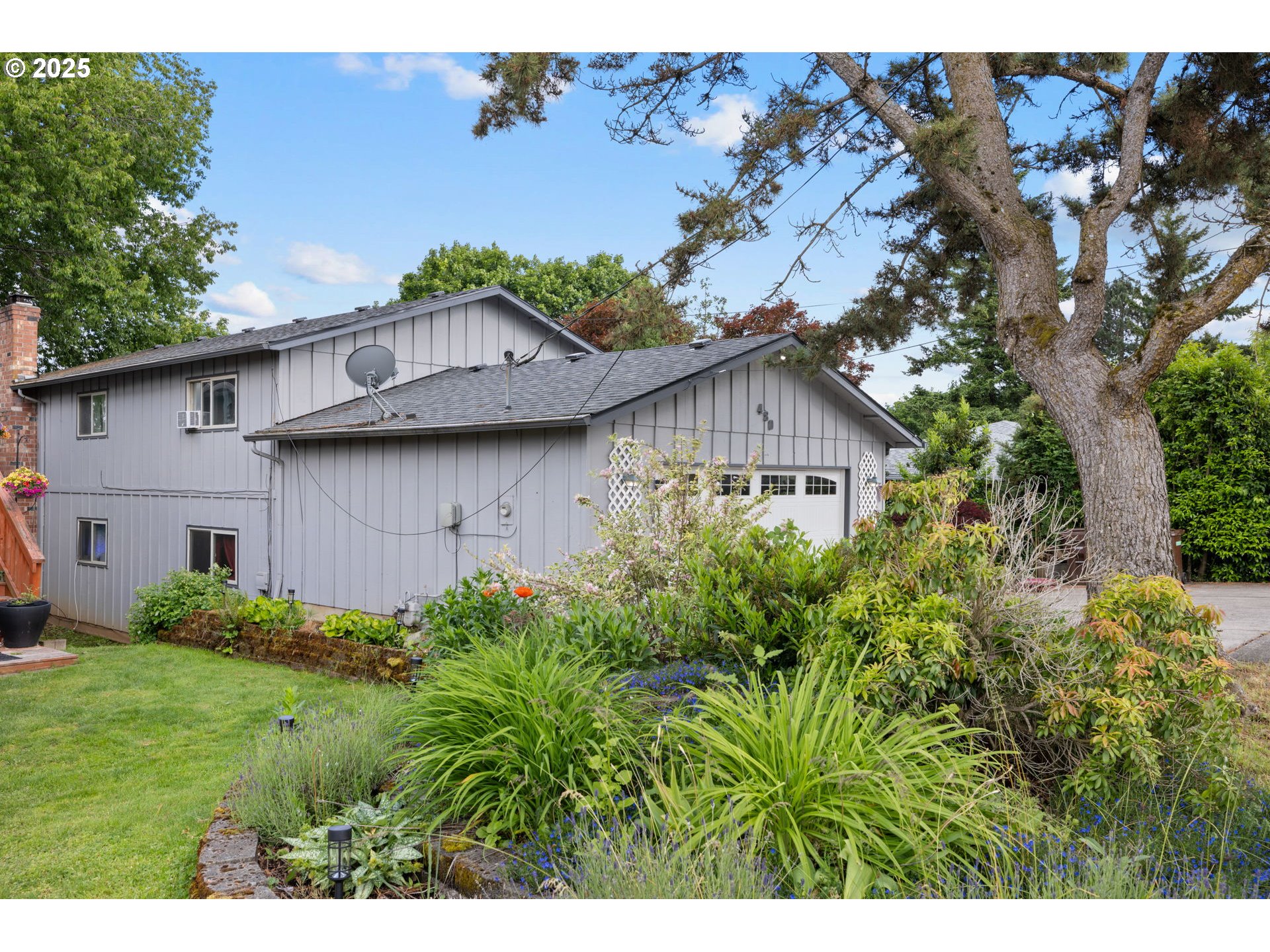 480 Northwest Norman Avenue Gresham, OR 97030 - Photo 40 of 40 a view of a house with a yard and tree s