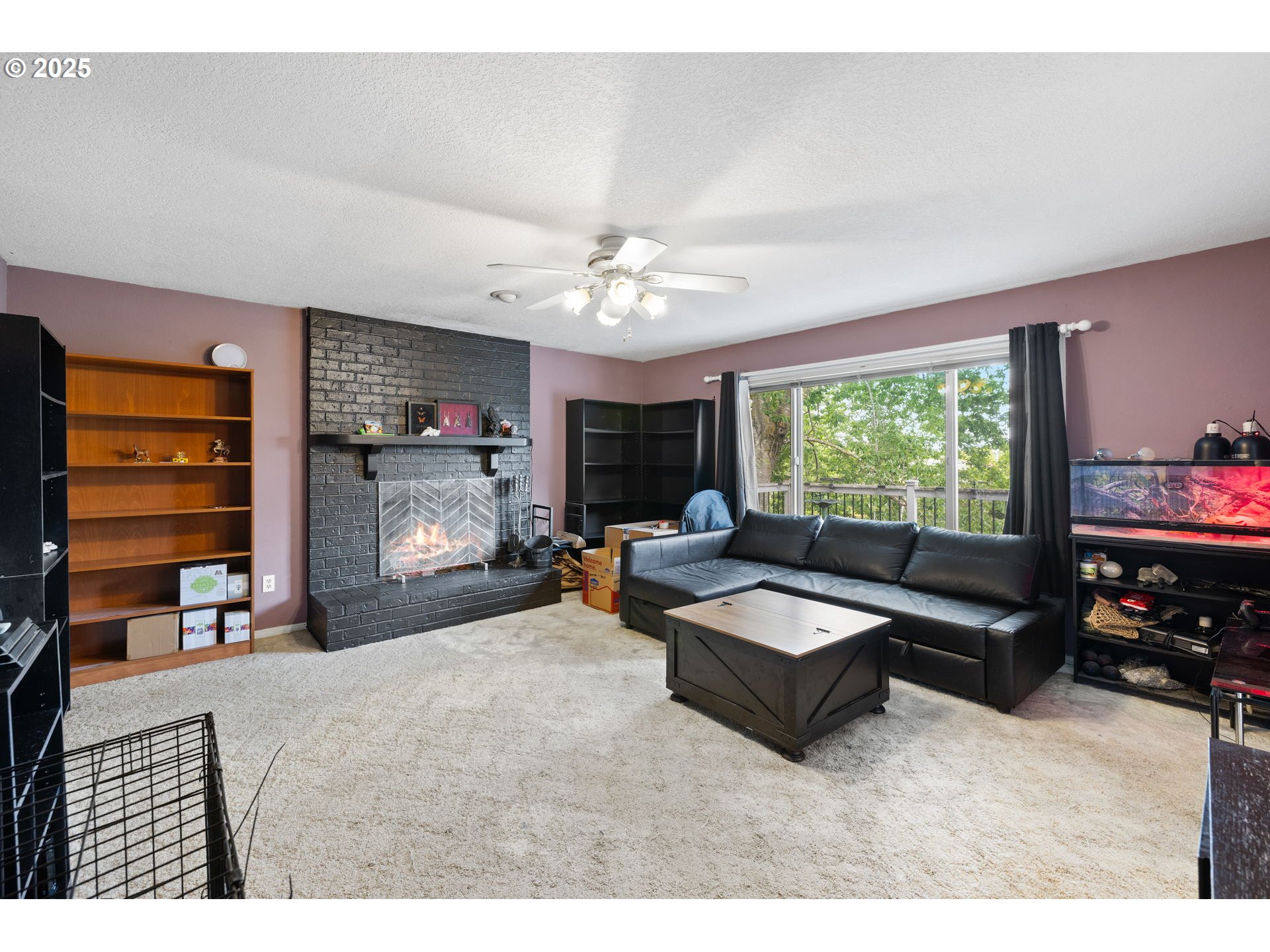 480 Northwest Norman Avenue Gresham, OR 97030 - Photo 4 of 40 a living room with furniture and a flat screen tv