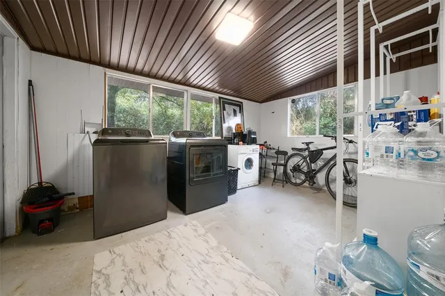 a bed room with furniture and a window