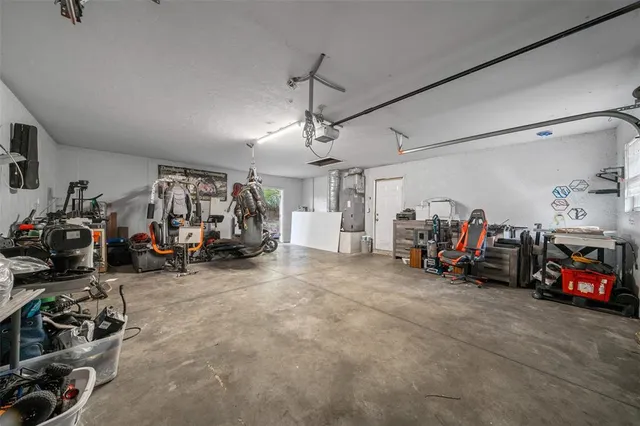 a view of a garage with a bike and car