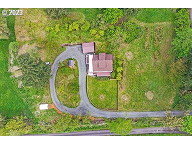 2514 Northwest 209th Street Ridgefield, WA 98642 - Photo 3 of 32 an aerial view of a house with garden space sitting space and garden