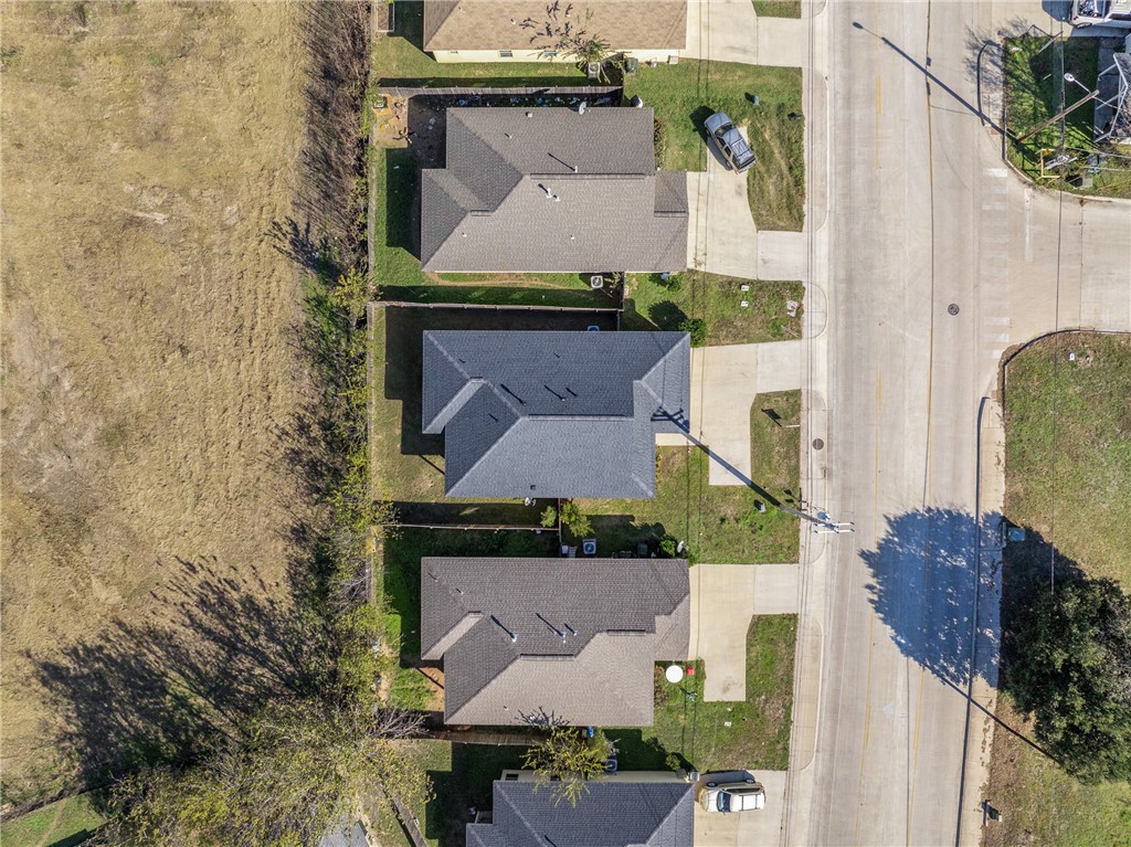930 West 28th Street Bryan, TX 77803 - Photo 24 of 30 an aerial view of a house with outdoor space