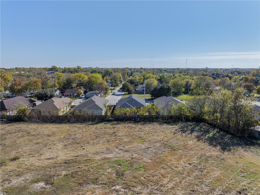 930 West 28th Street Bryan, TX 77803 - Photo 27 of 30 an aerial view of residential houses with outdoor space