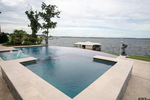 swimming pool with an outdoor seating