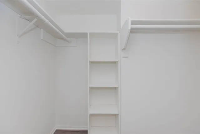 a view of an empty walk in closet