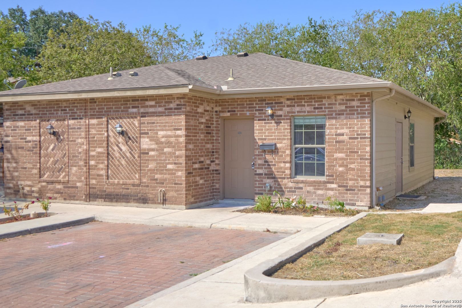 10911 Baltic Drive, Unit 102 San Antonio, TX 78213 - Photo 4 of 23 a aerial view of a house with a swimming pool