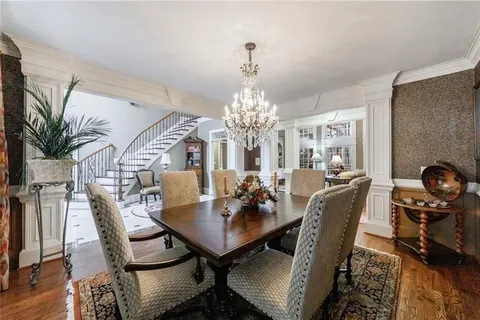 a view of a park with large trees