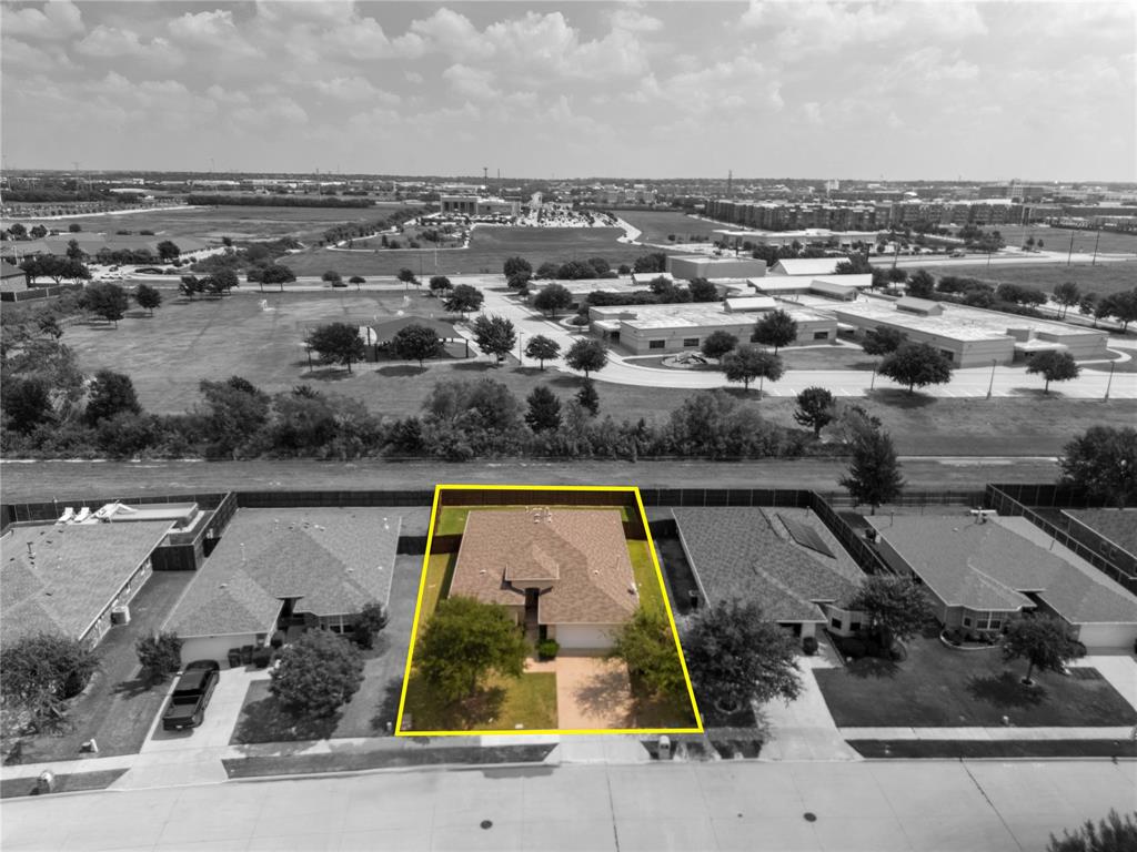 9822 Revolution Way Frisco, TX 75033 - Photo 27 of 29 an aerial view of a house with a swimming pool