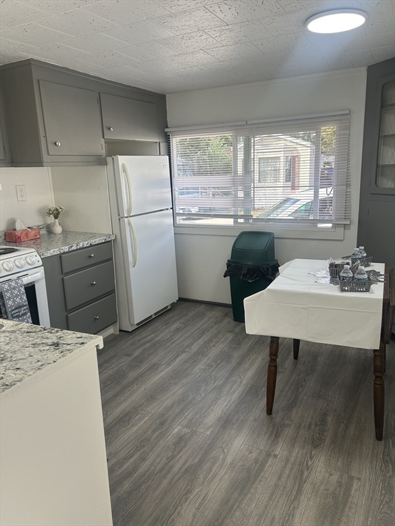1237 Central Street, Unit 15 Leominster, MA 01453 - Photo 11 of 25 a kitchen with a sink appliances and wooden floor