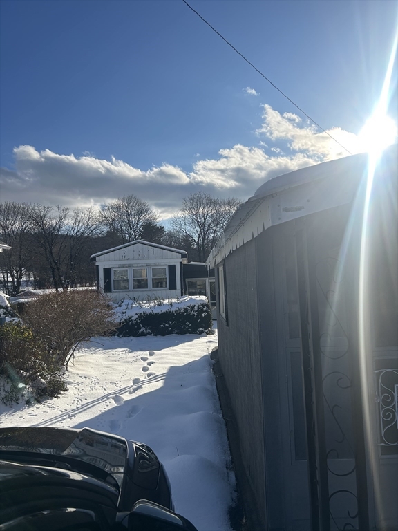 1237 Central Street, Unit 15 Leominster, MA 01453 - Photo 13 of 25 a view of a house with a yard