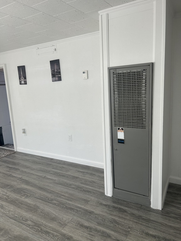 1237 Central Street, Unit 15 Leominster, MA 01453 - Photo 19 of 25 an empty room with wooden floor and closet