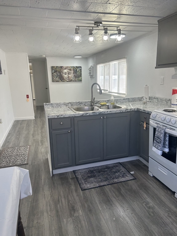 1237 Central Street, Unit 15 Leominster, MA 01453 - Photo 24 of 25 a kitchen with granite countertop a sink and cabinets