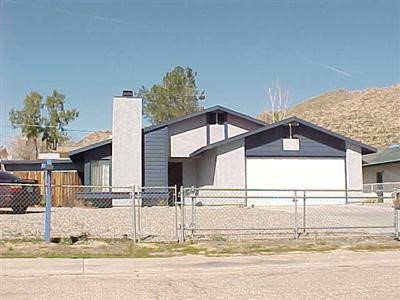 23932 Guajome Road Apple Valley, CA 92307 - Photo 1 of 1 a view of a house with a swimming pool