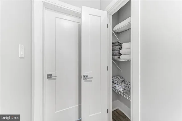 a bathroom with a shower and a sink