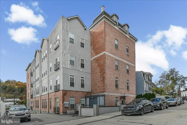 a view of a street with buildings