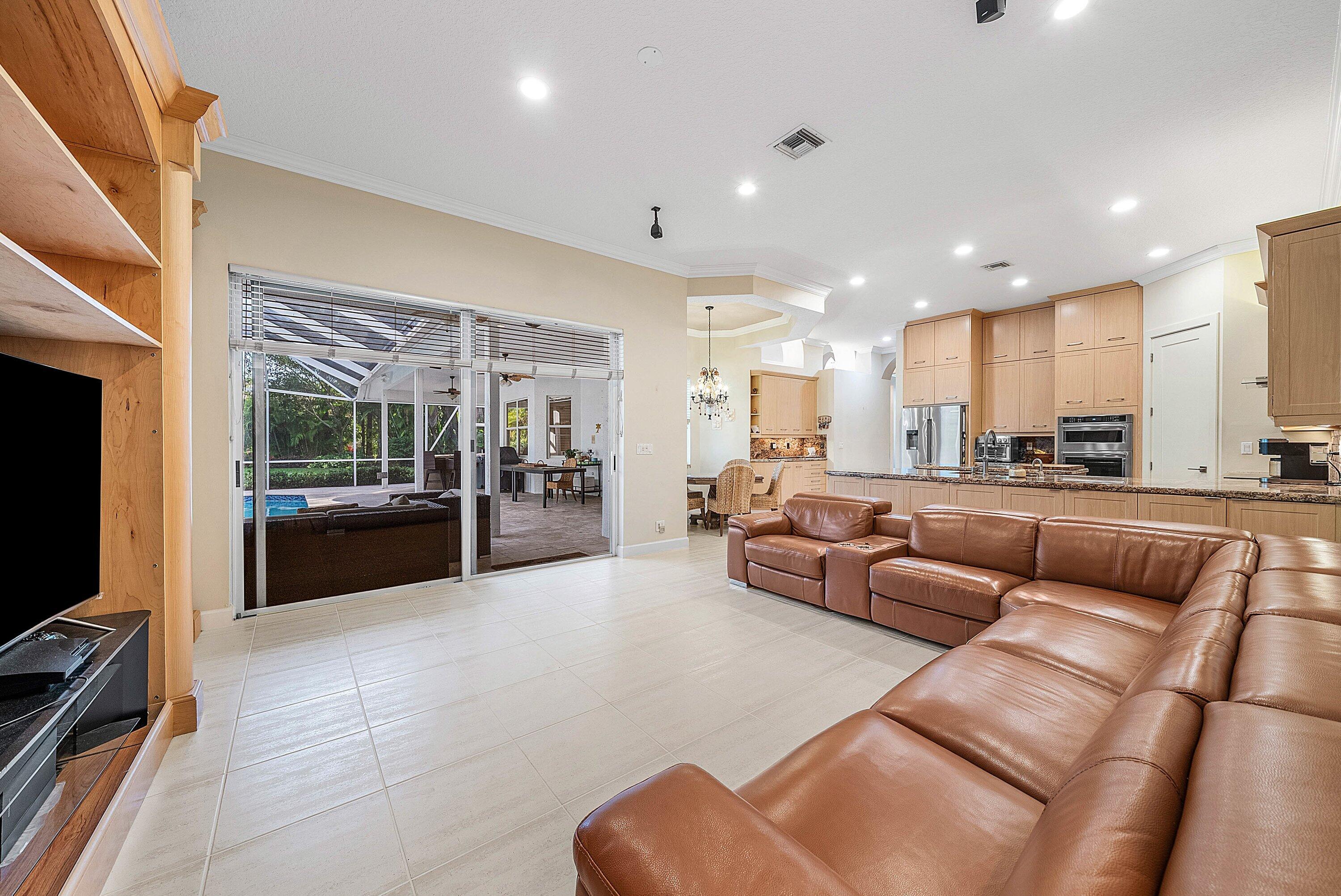 21374 Falls Ridge Way Boca Raton, FL 33428 - Photo 19 of 69 a living room with furniture and a flat screen tv