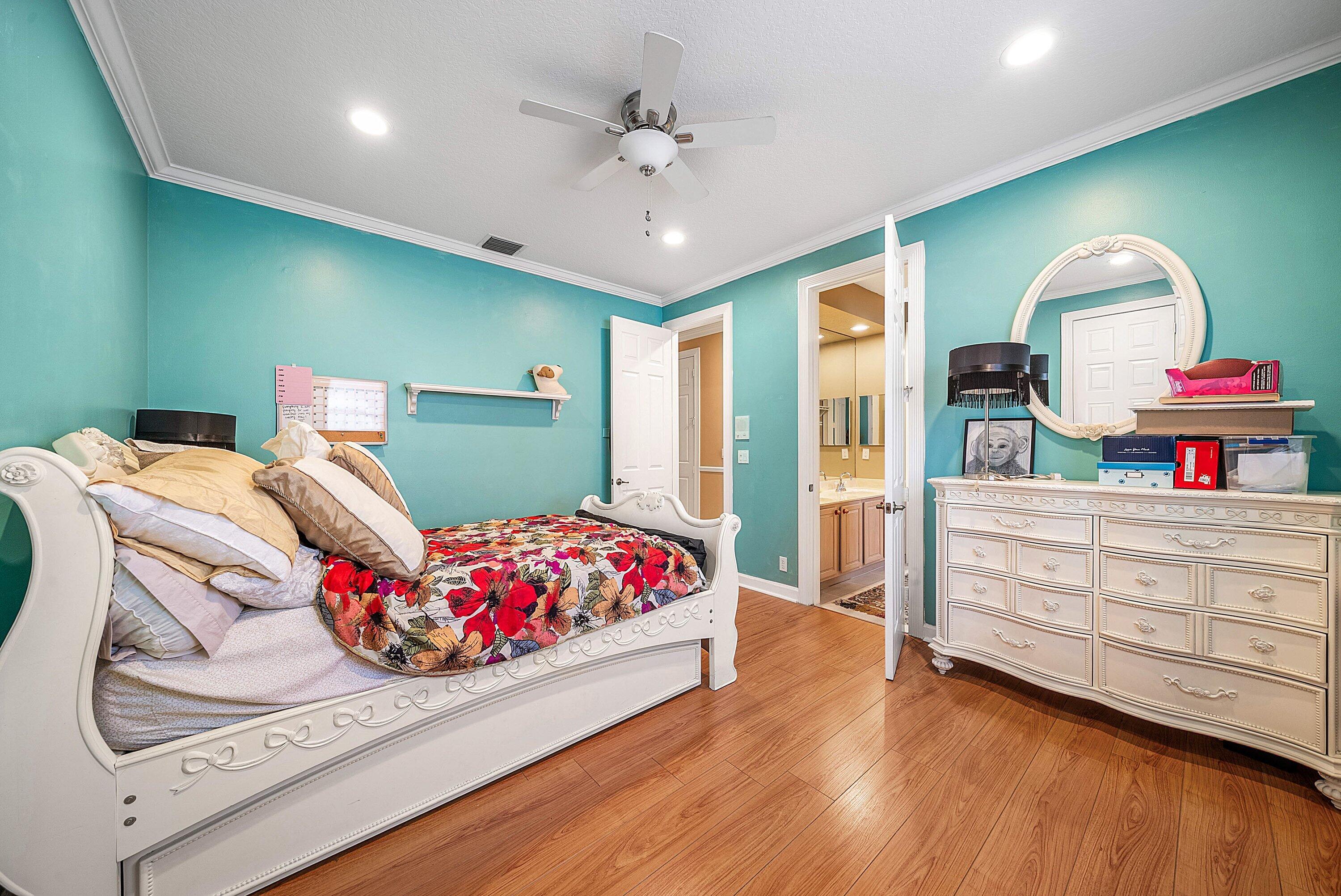 21374 Falls Ridge Way Boca Raton, FL 33428 - Photo 33 of 69 a bedroom with a bed and a dresser