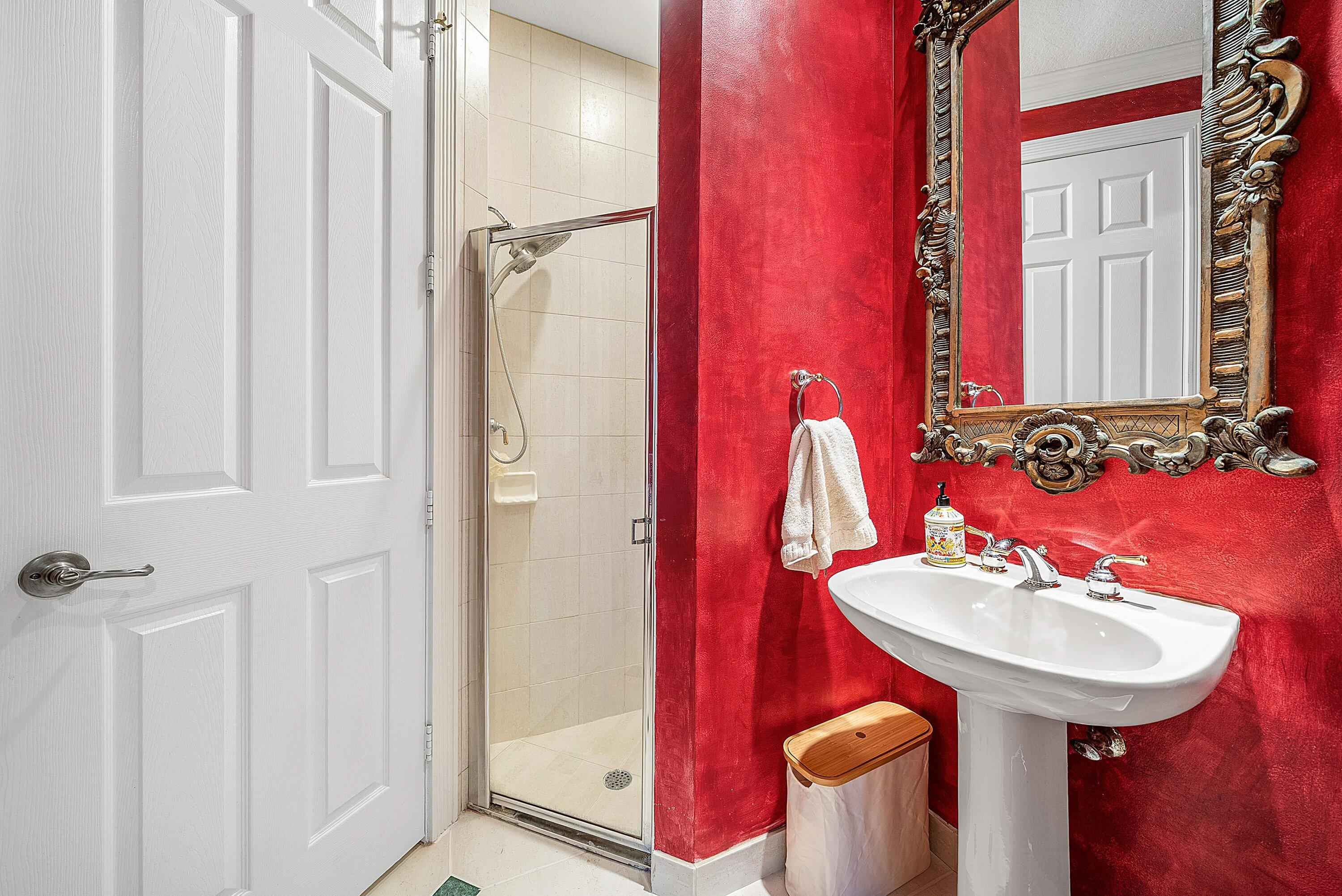 21374 Falls Ridge Way Boca Raton, FL 33428 - Photo 38 of 69 a bathroom with a sink and a mirror