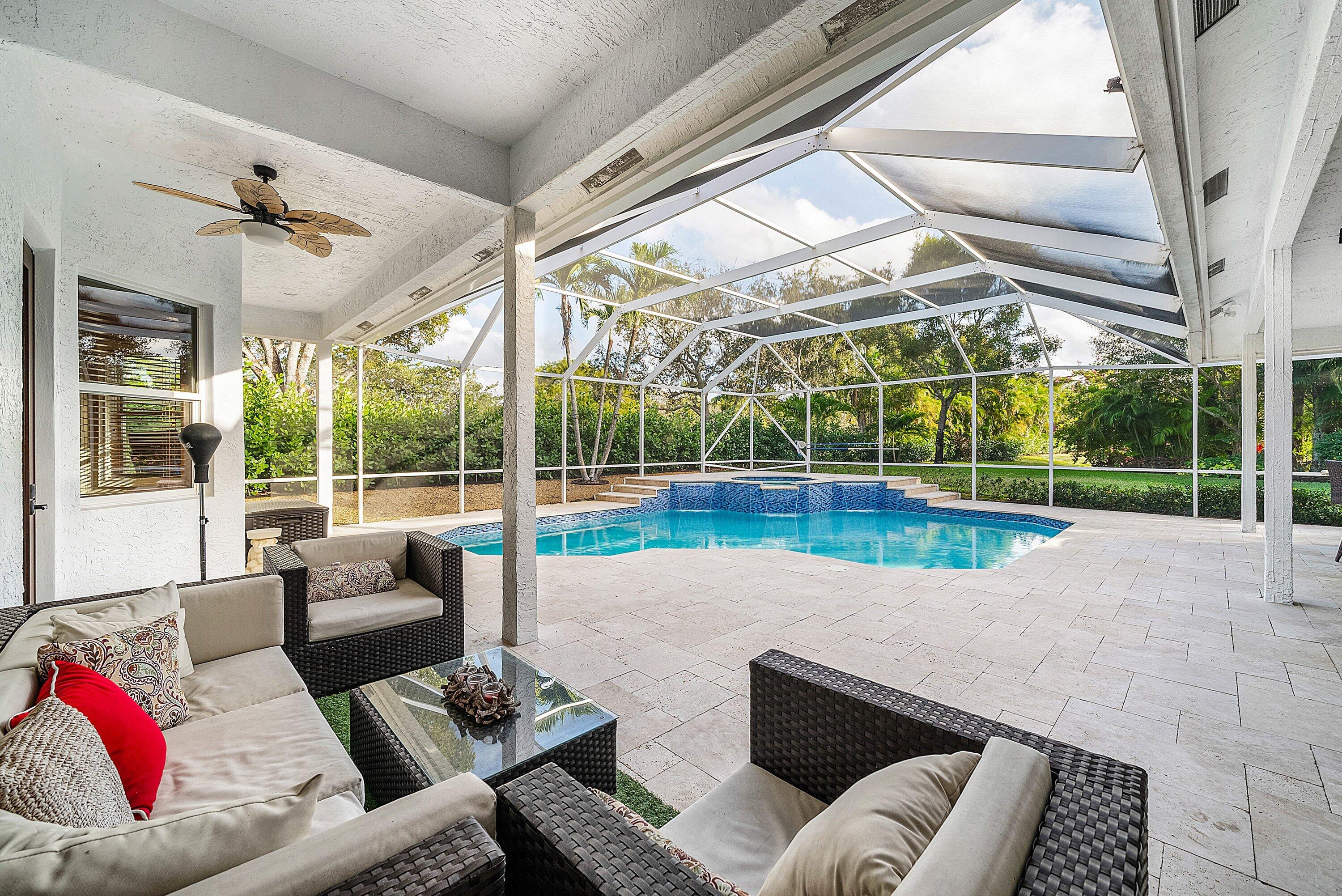 21374 Falls Ridge Way Boca Raton, FL 33428 - Photo 40 of 69 a view of a patio with couches and pool