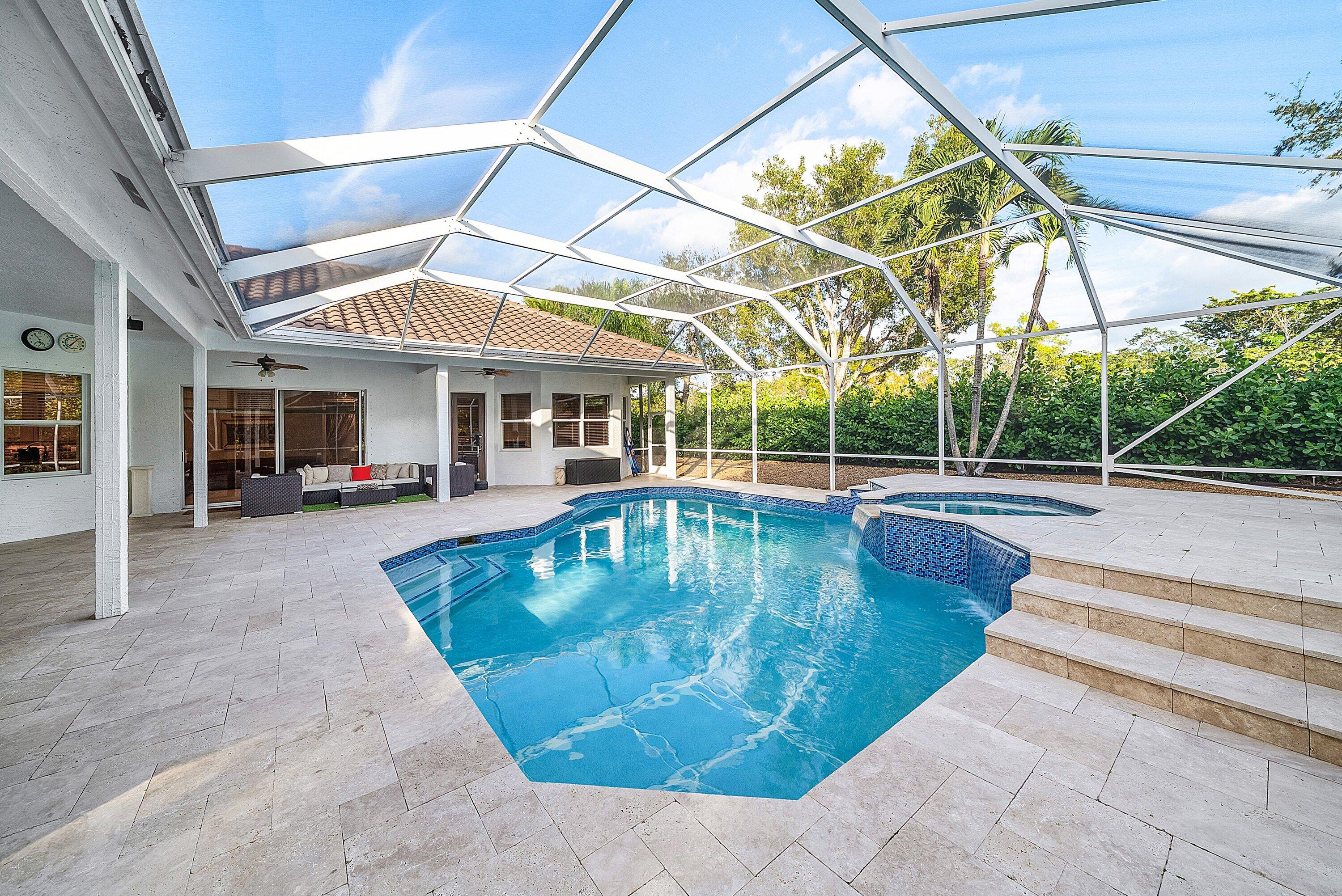 21374 Falls Ridge Way Boca Raton, FL 33428 - Photo 45 of 69 a view of a swimming pool with a patio