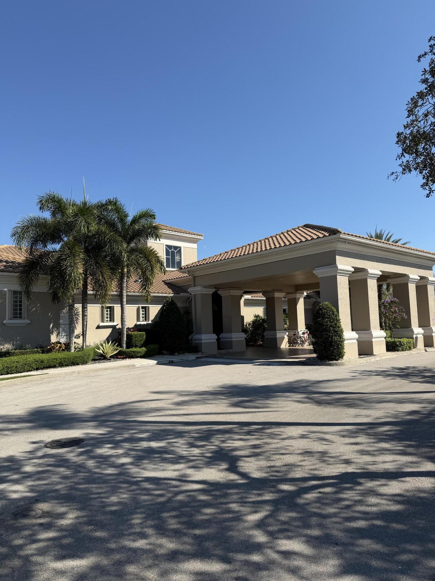 21374 Falls Ridge Way Boca Raton, FL 33428 - Photo 51 of 69 a front view of a house