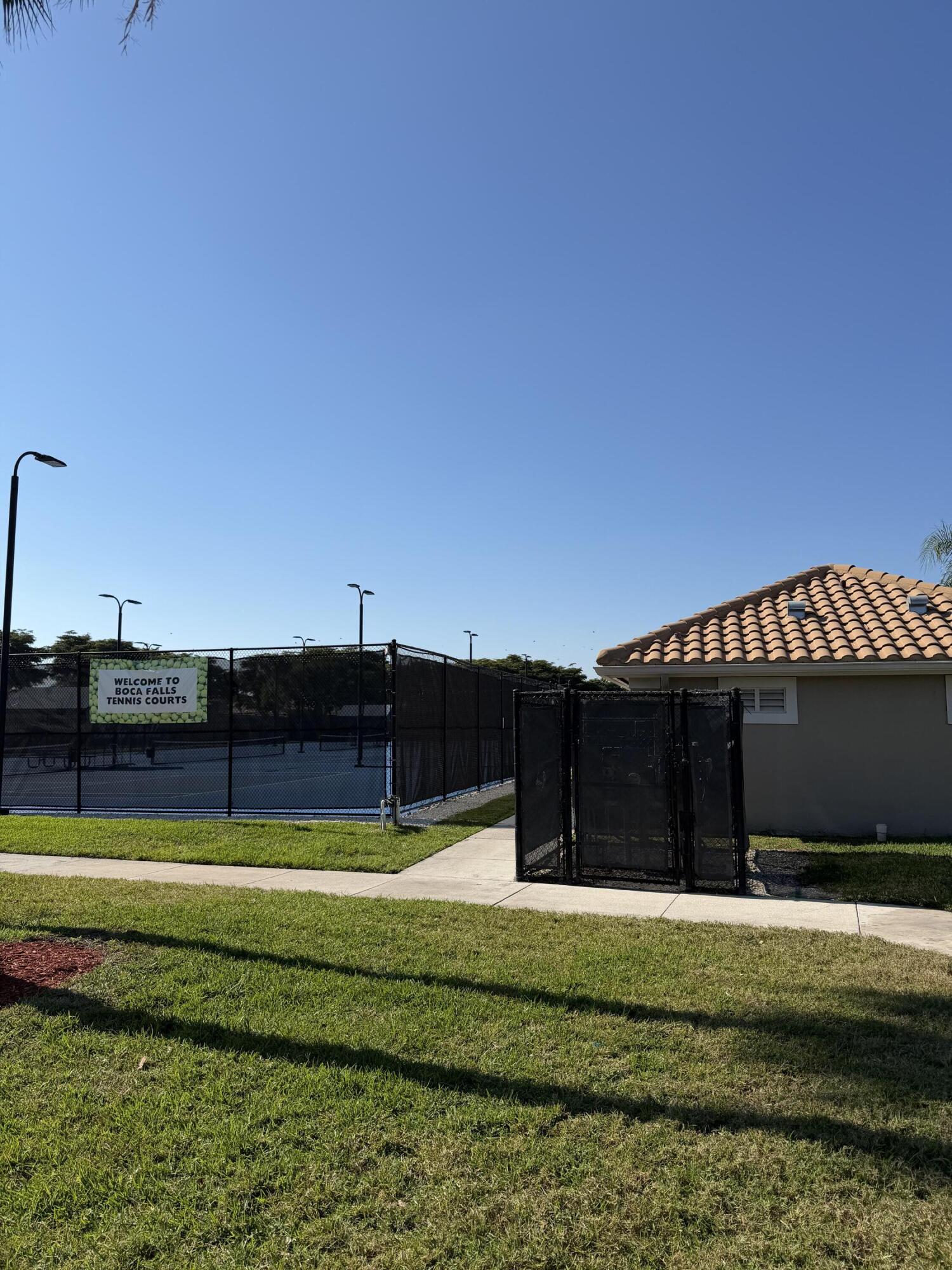 21374 Falls Ridge Way Boca Raton, FL 33428 - Photo 64 of 69 a view of a house with a yard