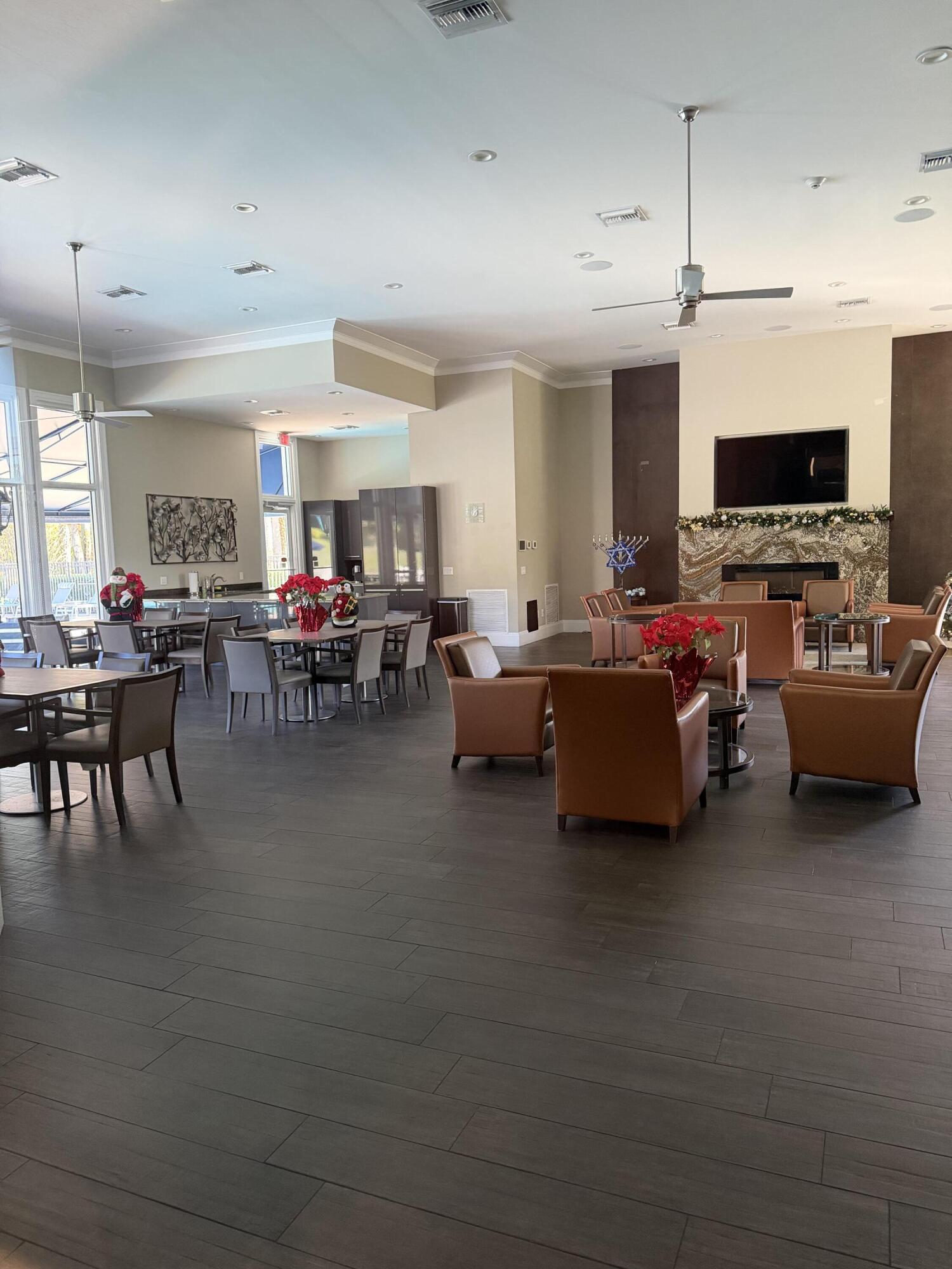 21374 Falls Ridge Way Boca Raton, FL 33428 - Photo 66 of 69 a living room with furniture and a flat screen tv