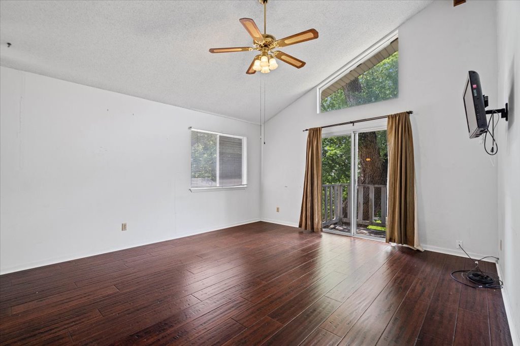 7229 South Brook Drive Austin, TX 78736 - Photo 10 of 20 2nd floor primary, vaulted ceilings with balcony
