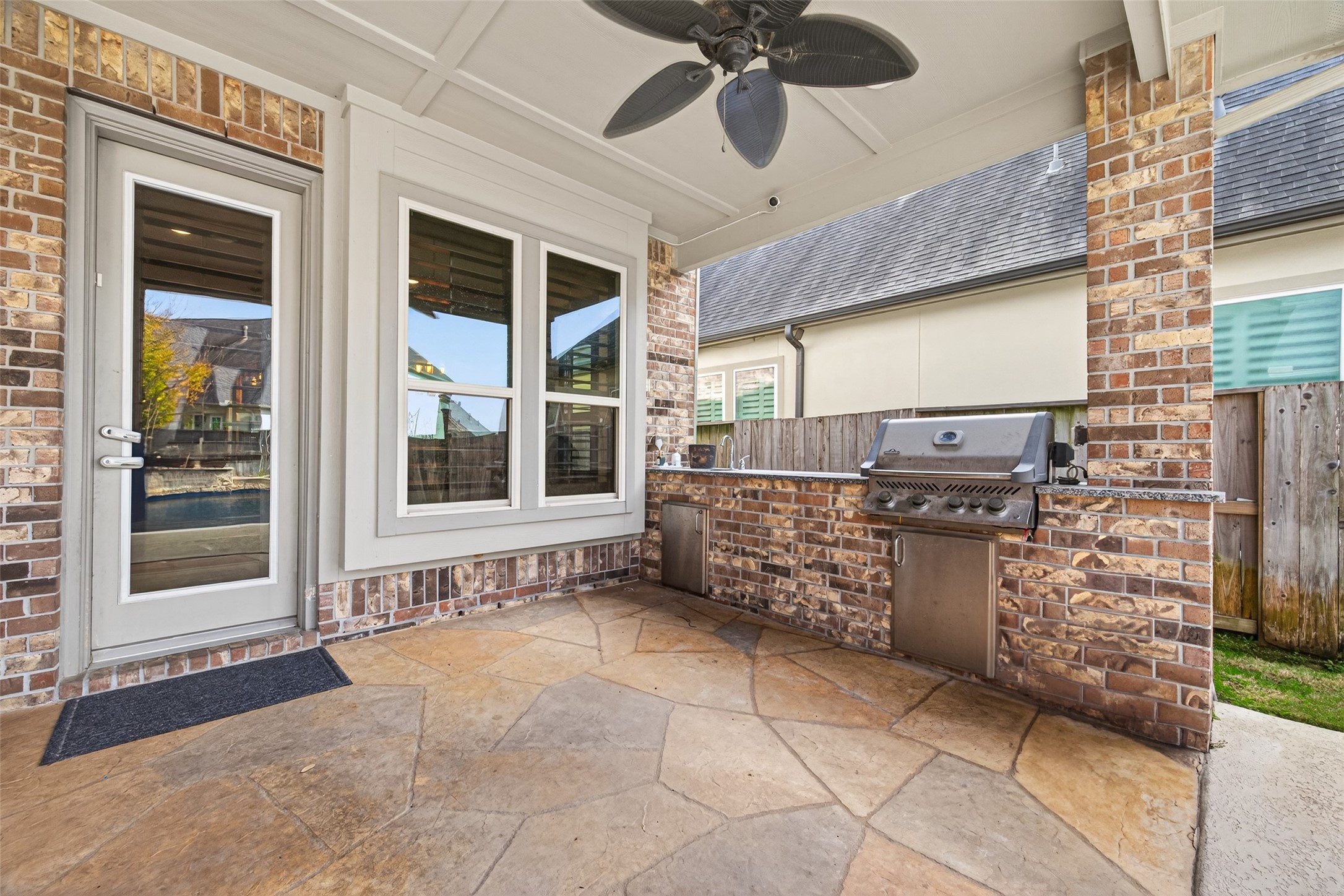 7014 Prairie Grass Lane Katy, TX 77493 - Photo 36 of 49 a view of an entryway with a brick wall