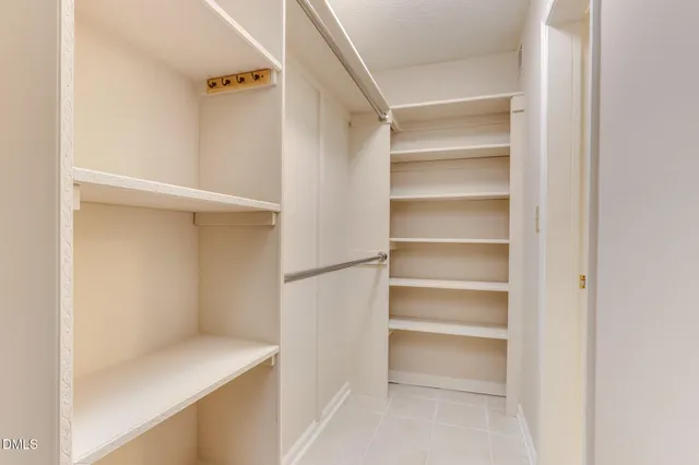 a view of a bathroom with bathtub