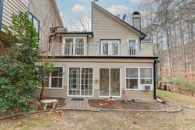 a view of a backyard of the house