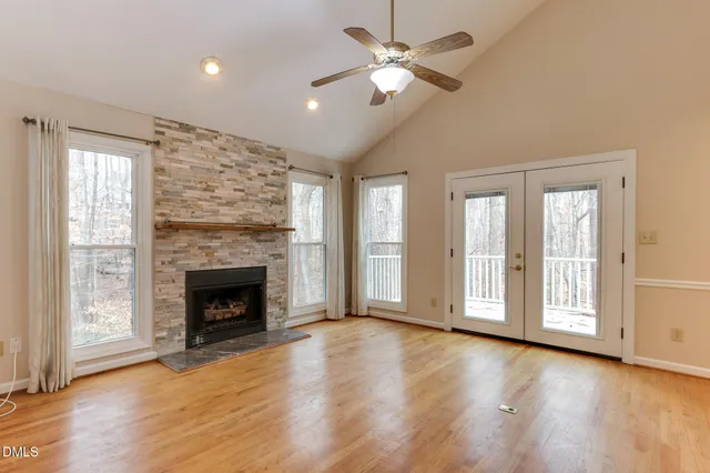 a kitchen with a sink a counter space stainless steel appliances and cabinets