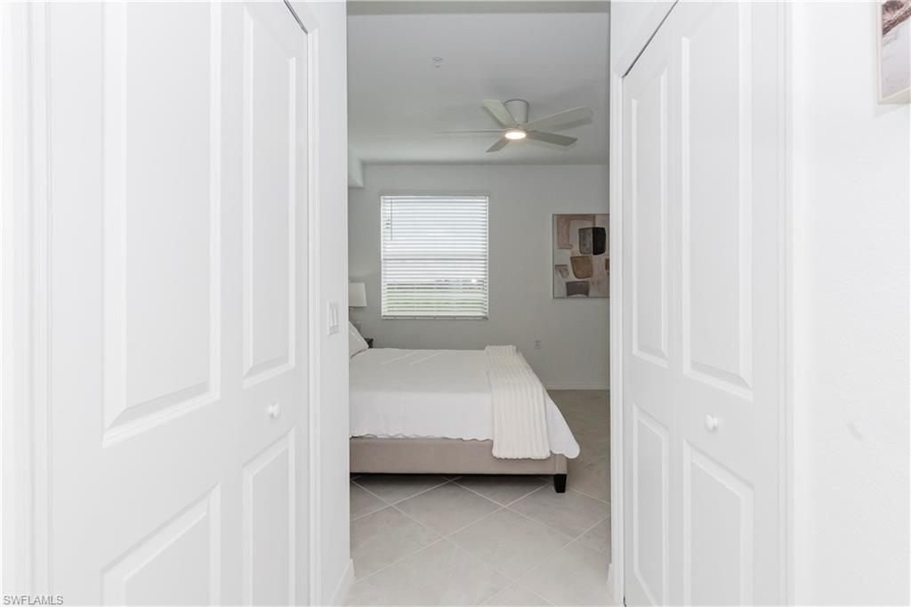 15285 Grn Acrs Avenue, Unit 418 Babcock Ranch, FL 33982 - Photo 16 of 49 a bedroom with a bed and a window