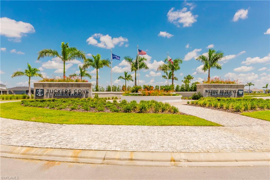 15285 Grn Acrs Avenue, Unit 418 Babcock Ranch, FL 33982 - Photo 32 of 49 a view of a house with outdoor space and sitting area