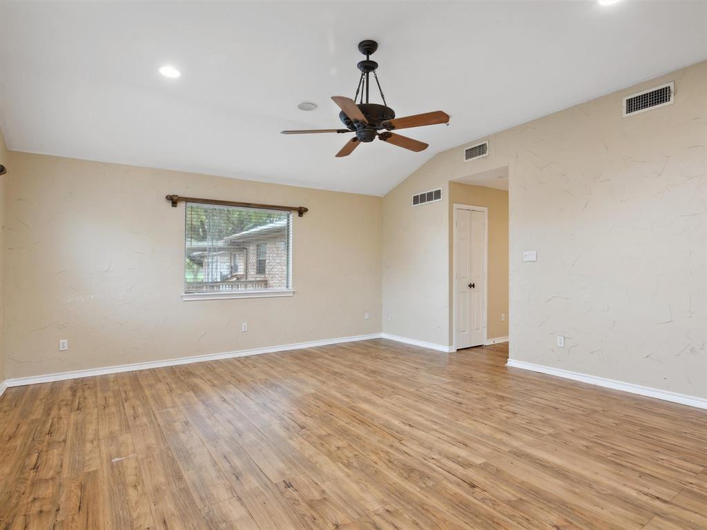 1302 Forreston Road Waxahachie, TX 75165 - Photo 31 of 39 a view of an empty room with wooden floor