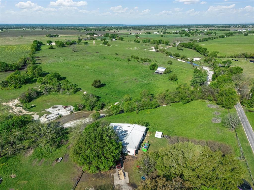 1302 Forreston Road Waxahachie, TX 75165 - Photo 37 of 39 a view of a green field with lots of green plants in it