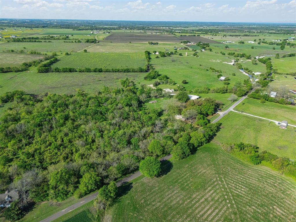 1302 Forreston Road Waxahachie, TX 75165 - Photo 7 of 39 a view of a field with an ocean