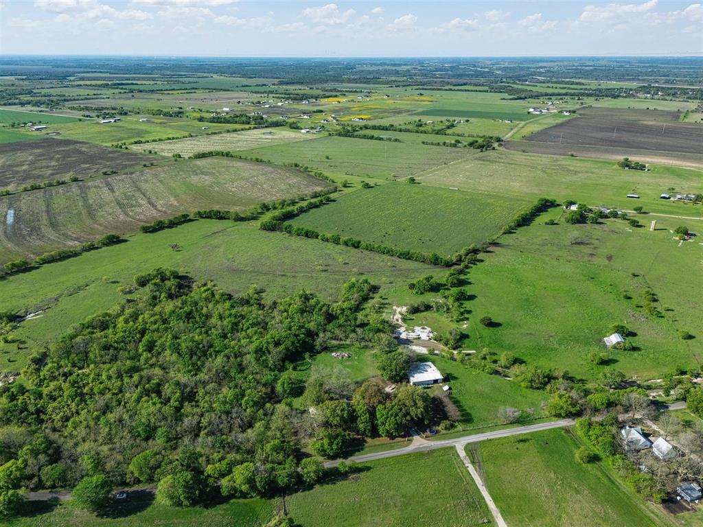 1302 Forreston Road Waxahachie, TX 75165 - Photo 8 of 39 a view of a field with an ocean