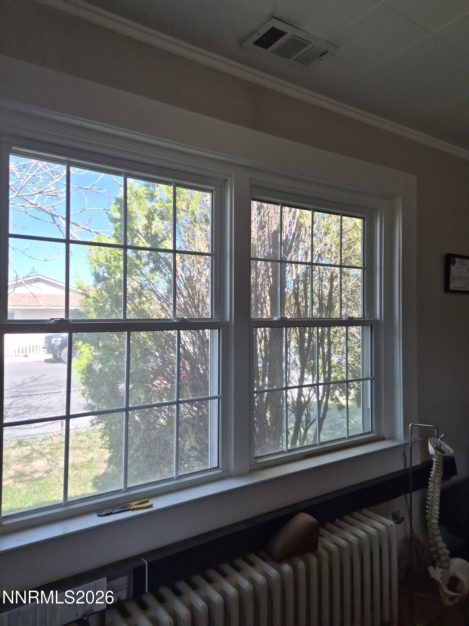 210 South Taylor Street Fallon, NV 89406 - Photo 32 of 38 a bed sitting in a bedroom next to a window