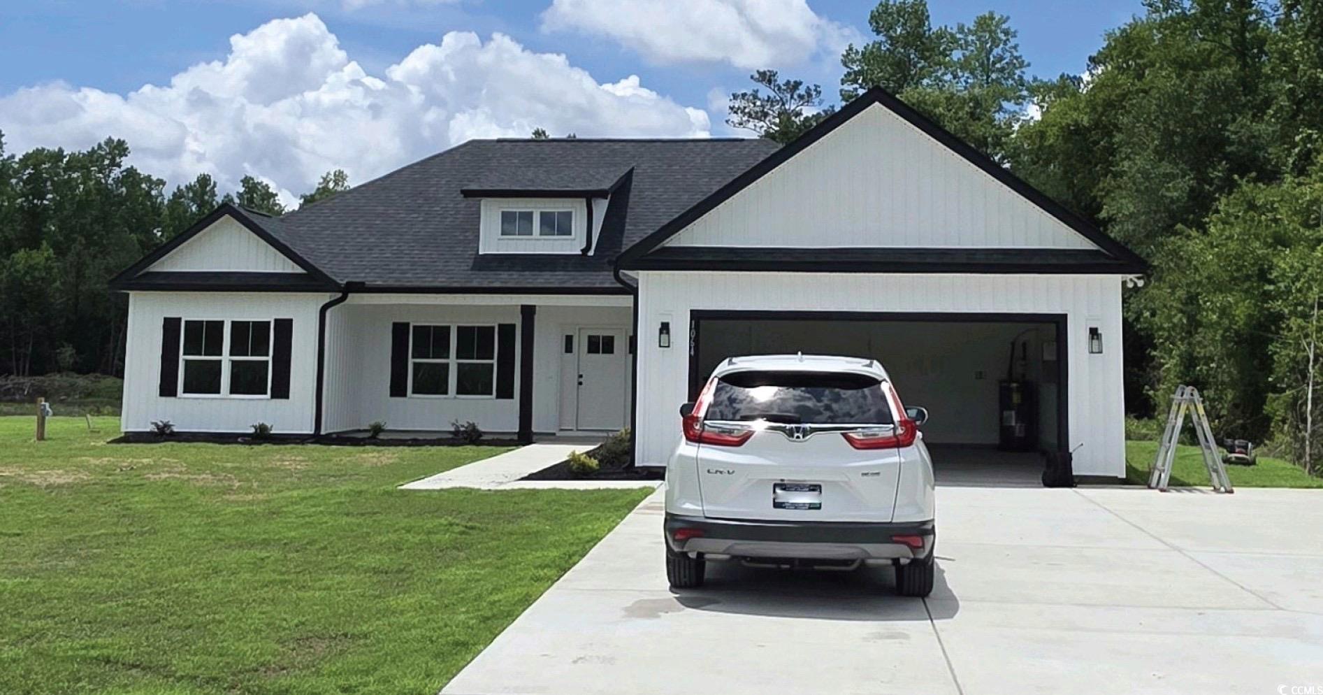 1064 Merritt Road Conway, SC 29526 - Photo 1 of 18 View of front facade with driveway, a front yard,