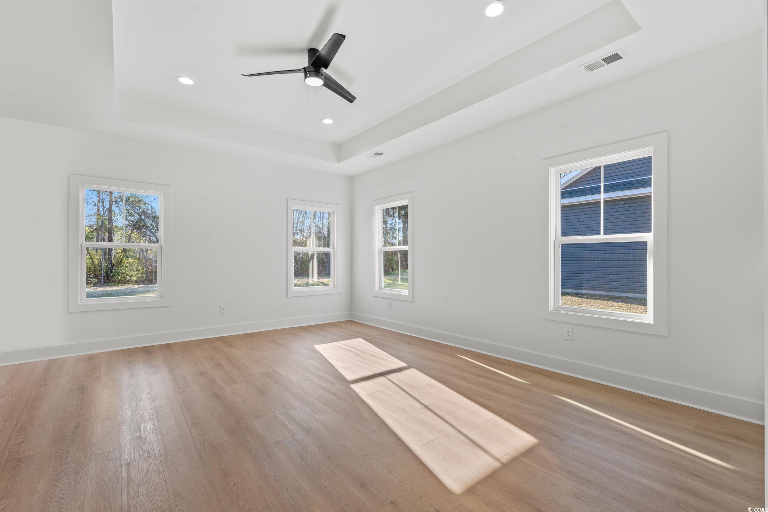 1064 Merritt Road Conway, SC 29526 - Photo 8 of 18 Empty room with visible vents, a raised ceiling, b