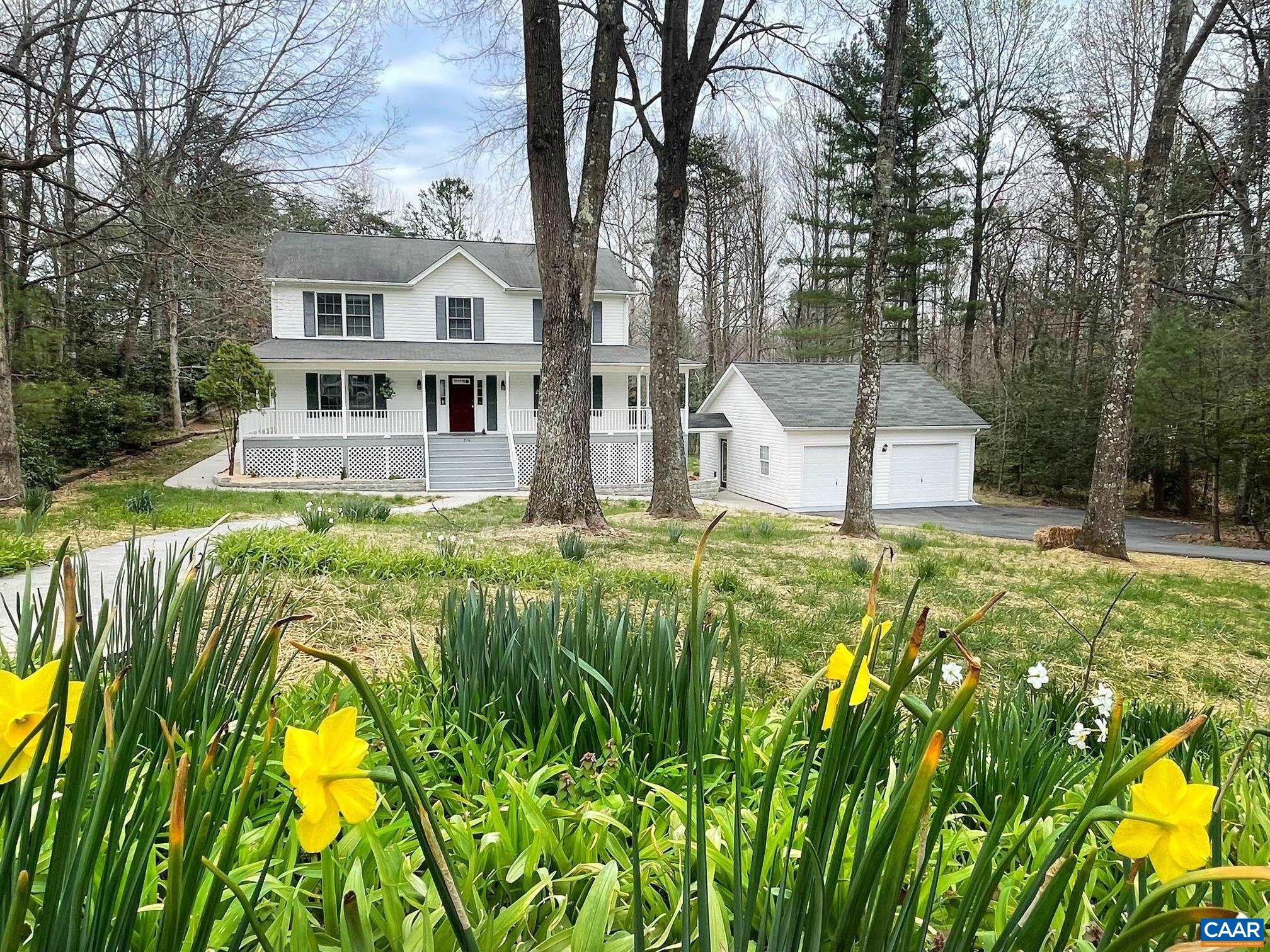 216 Rudolph Street Ruckersville, VA 22968 - Photo 1 of 39 a view of a house with a swimming pool