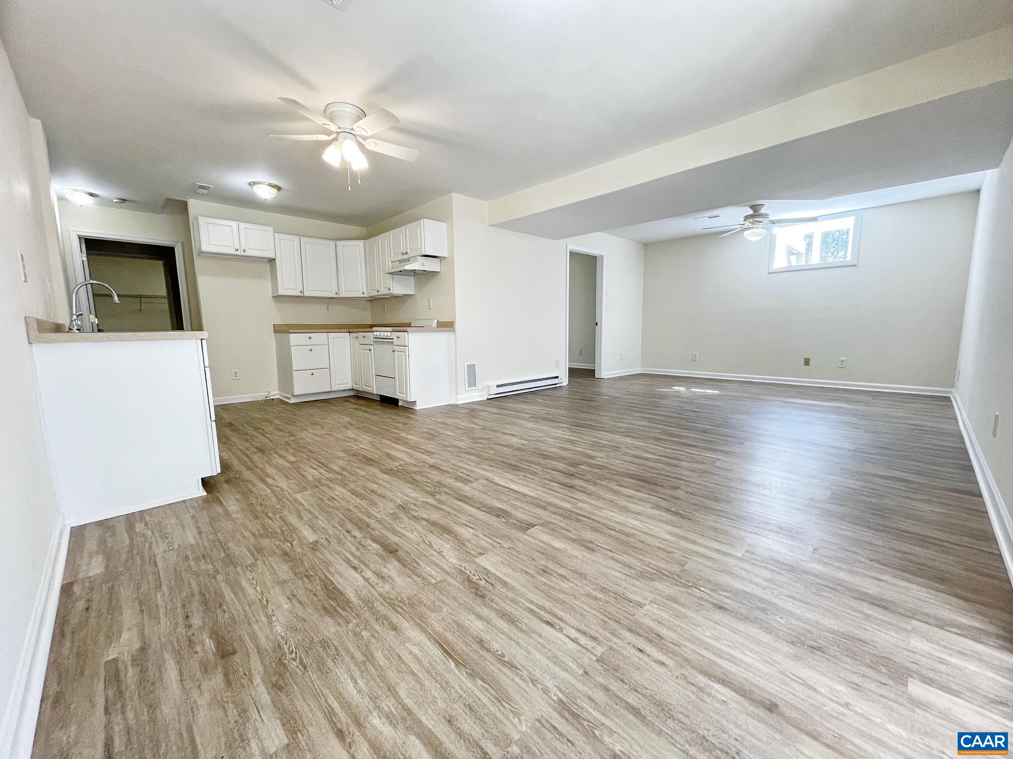 216 Rudolph Street Ruckersville, VA 22968 - Photo 27 of 39 a view of a kitchen with microwave and cabinets