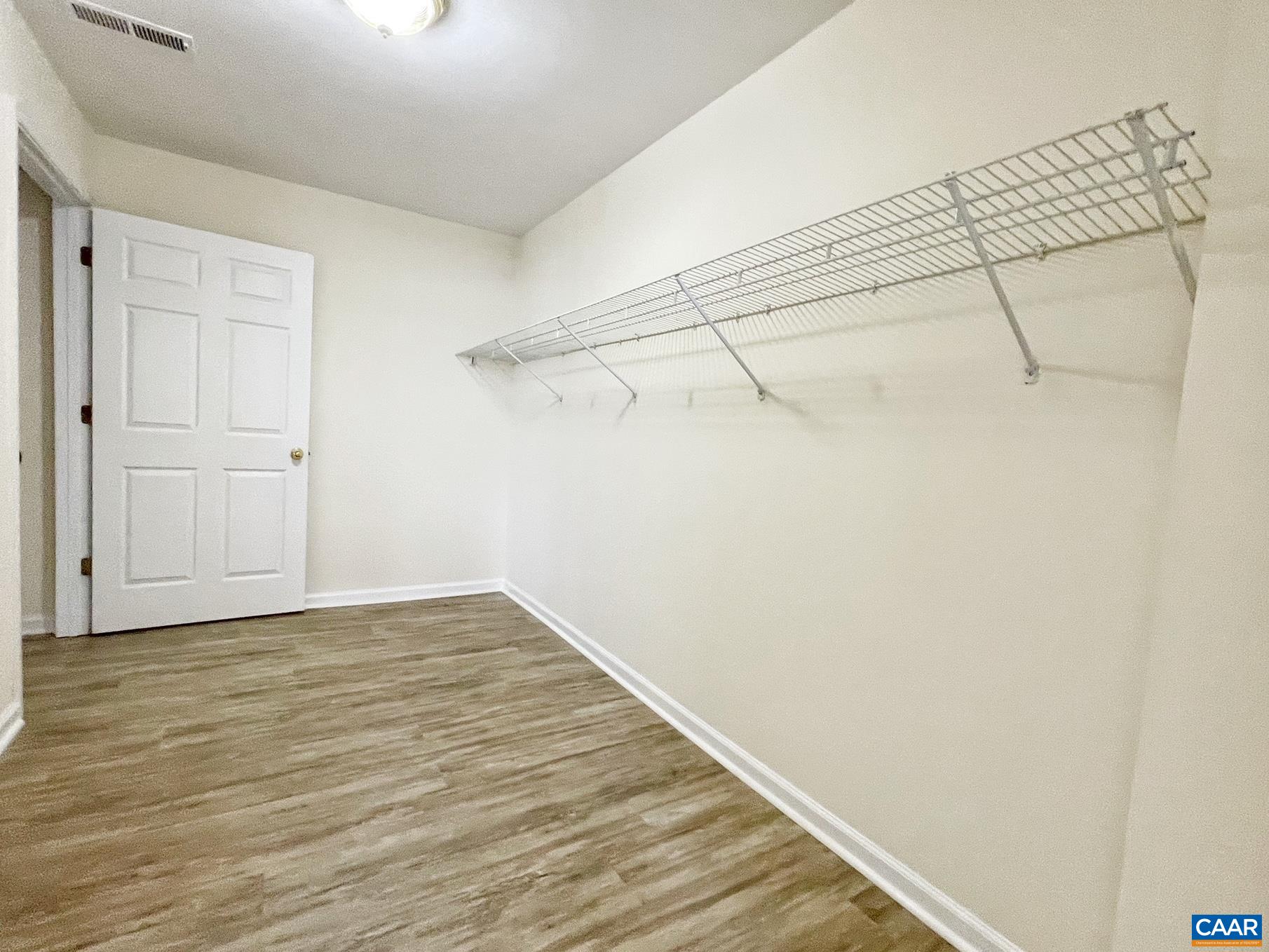 216 Rudolph Street Ruckersville, VA 22968 - Photo 30 of 39 a view of a room with wooden floor