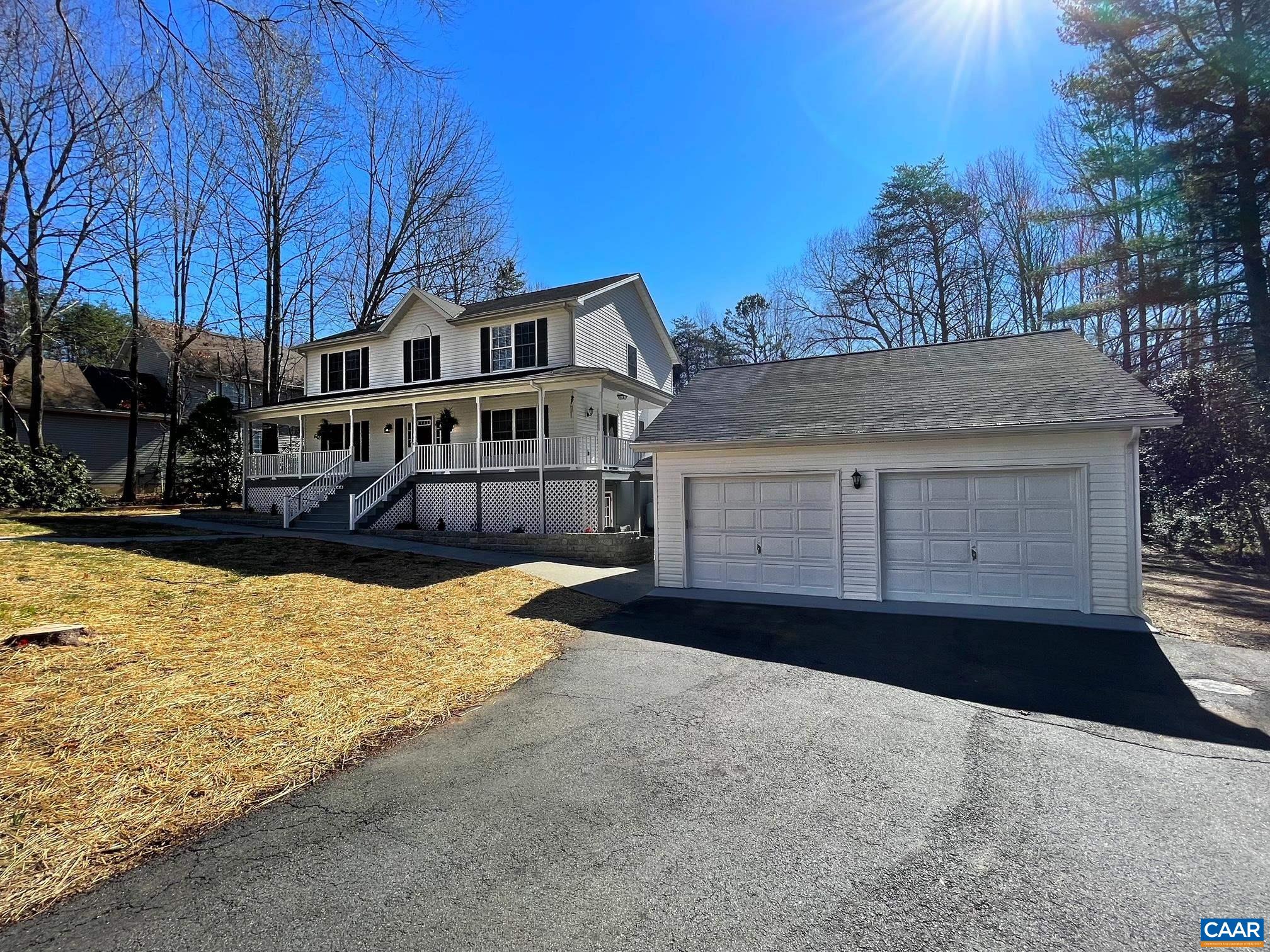 216 Rudolph Street Ruckersville, VA 22968 - Photo 33 of 39 a front view of a house with a yard covered with snow