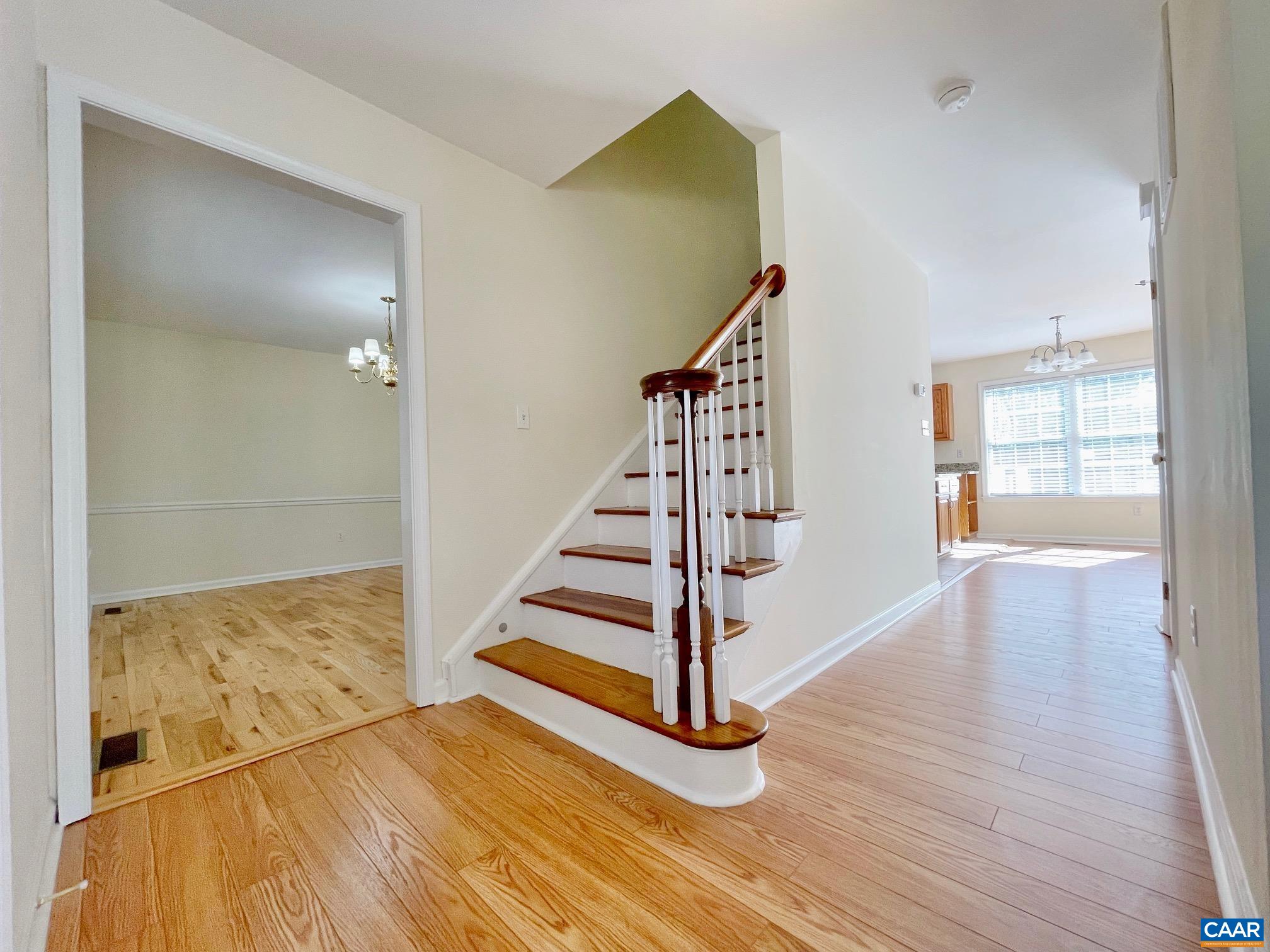 216 Rudolph Street Ruckersville, VA 22968 - Photo 6 of 39 a view of a room with wooden floor and stairs
