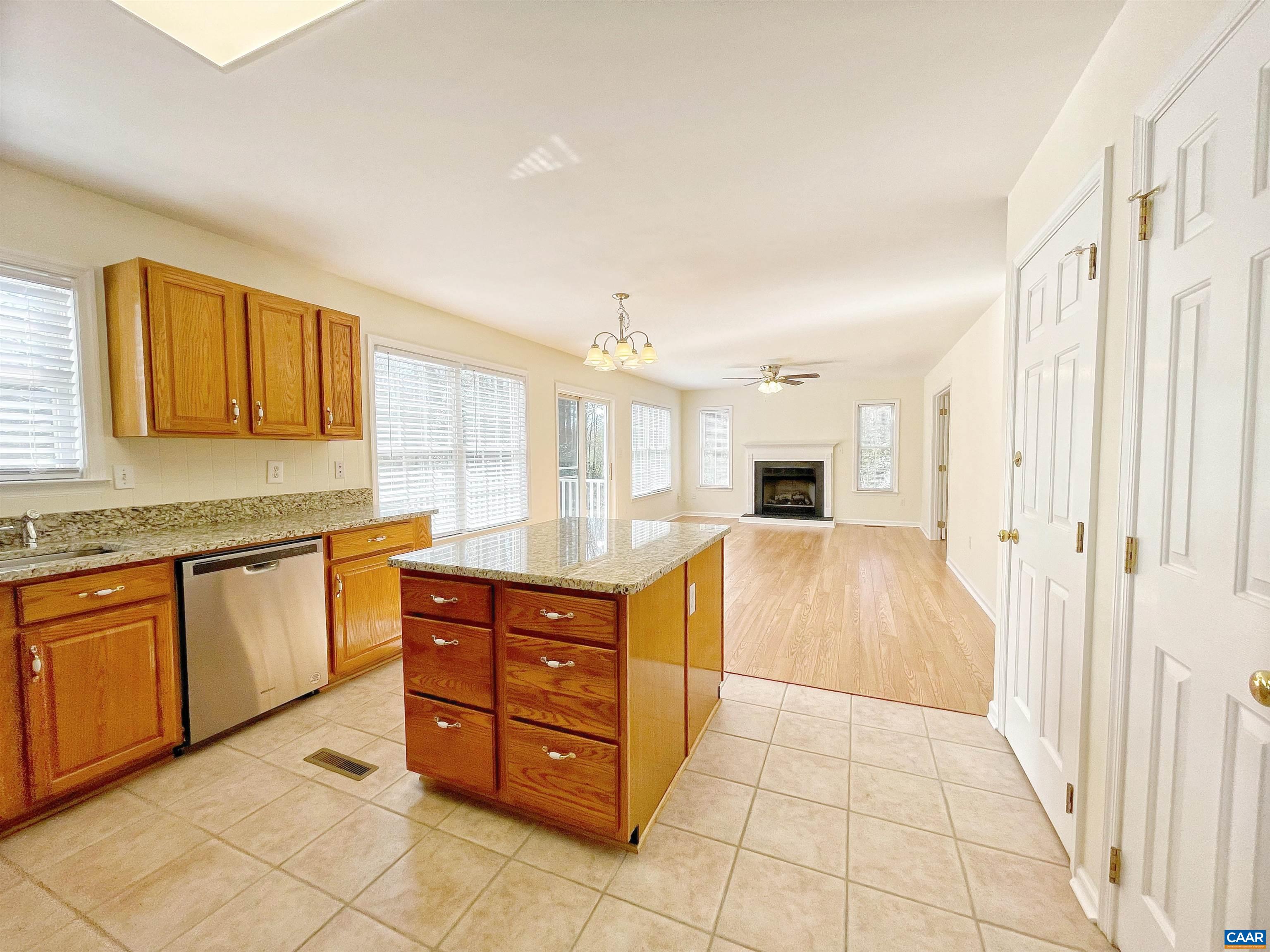 216 Rudolph Street Ruckersville, VA 22968 - Photo 10 of 39 a large kitchen with stainless steel appliances granite countertop a sink and cabinets