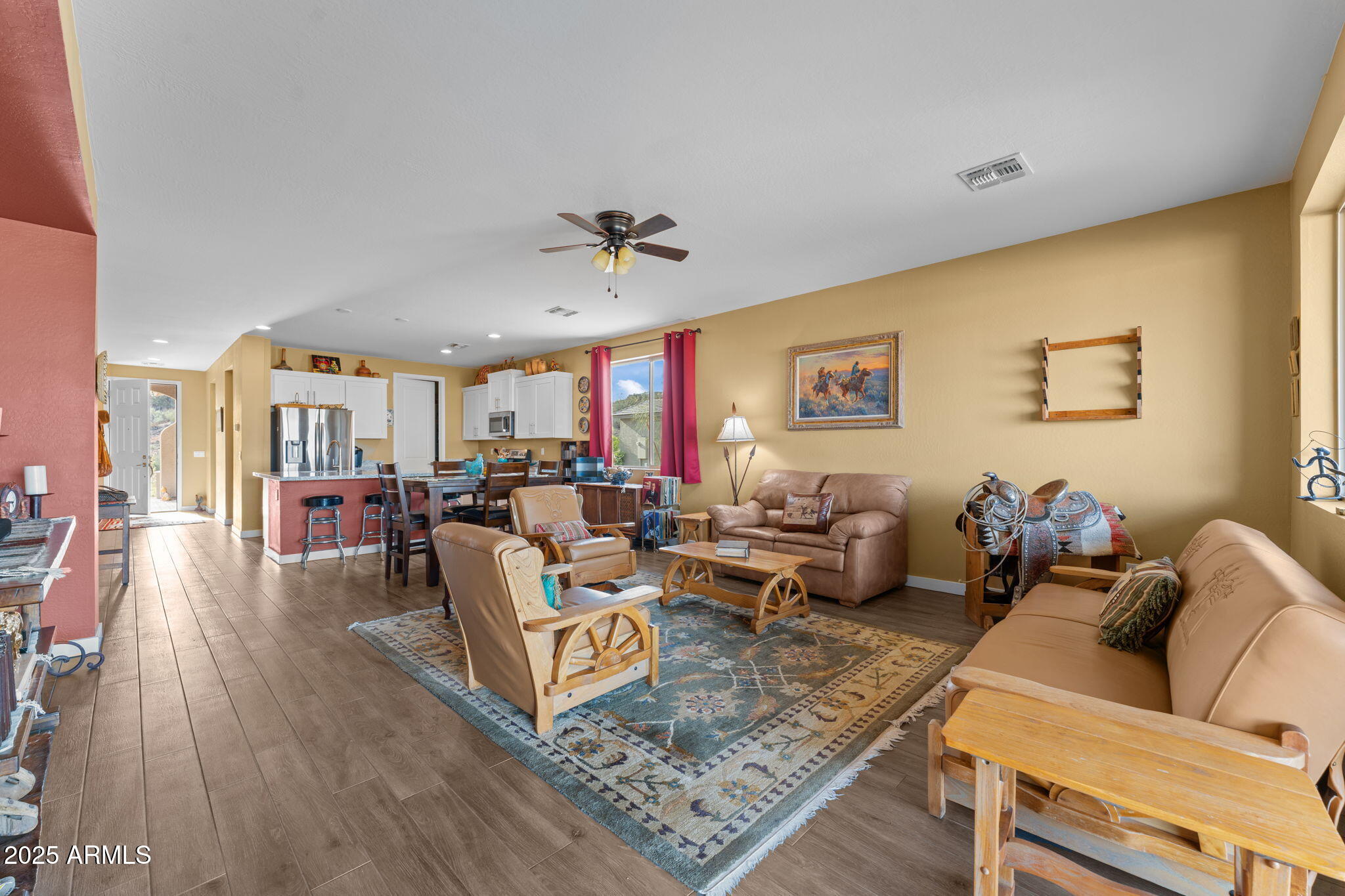 1900 West Ringo Road Wickenburg, AZ 85390 - Photo 15 of 37 a living room with furniture and wooden floor