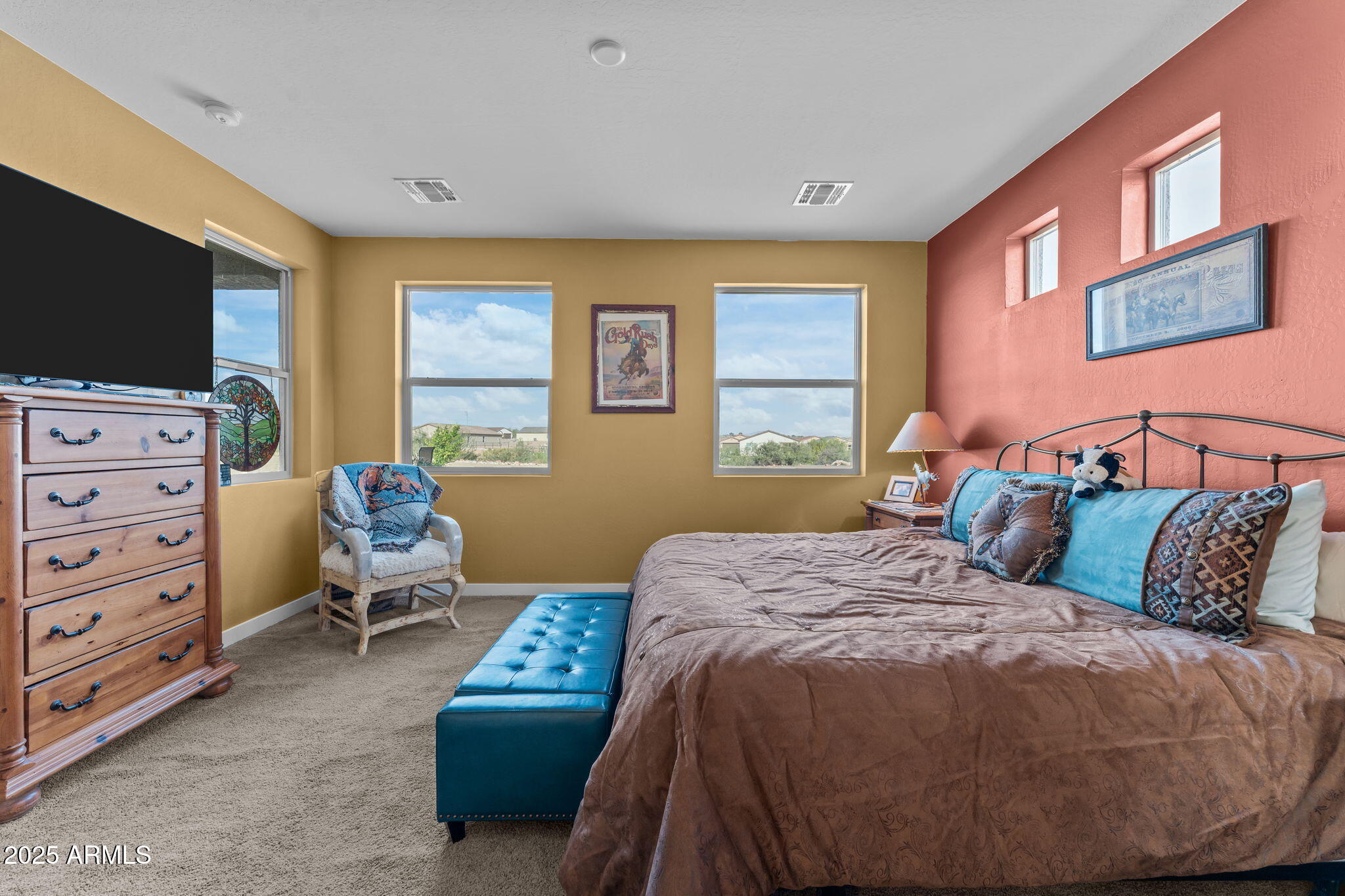 1900 West Ringo Road Wickenburg, AZ 85390 - Photo 16 of 37 a bedroom with a bed and furniture