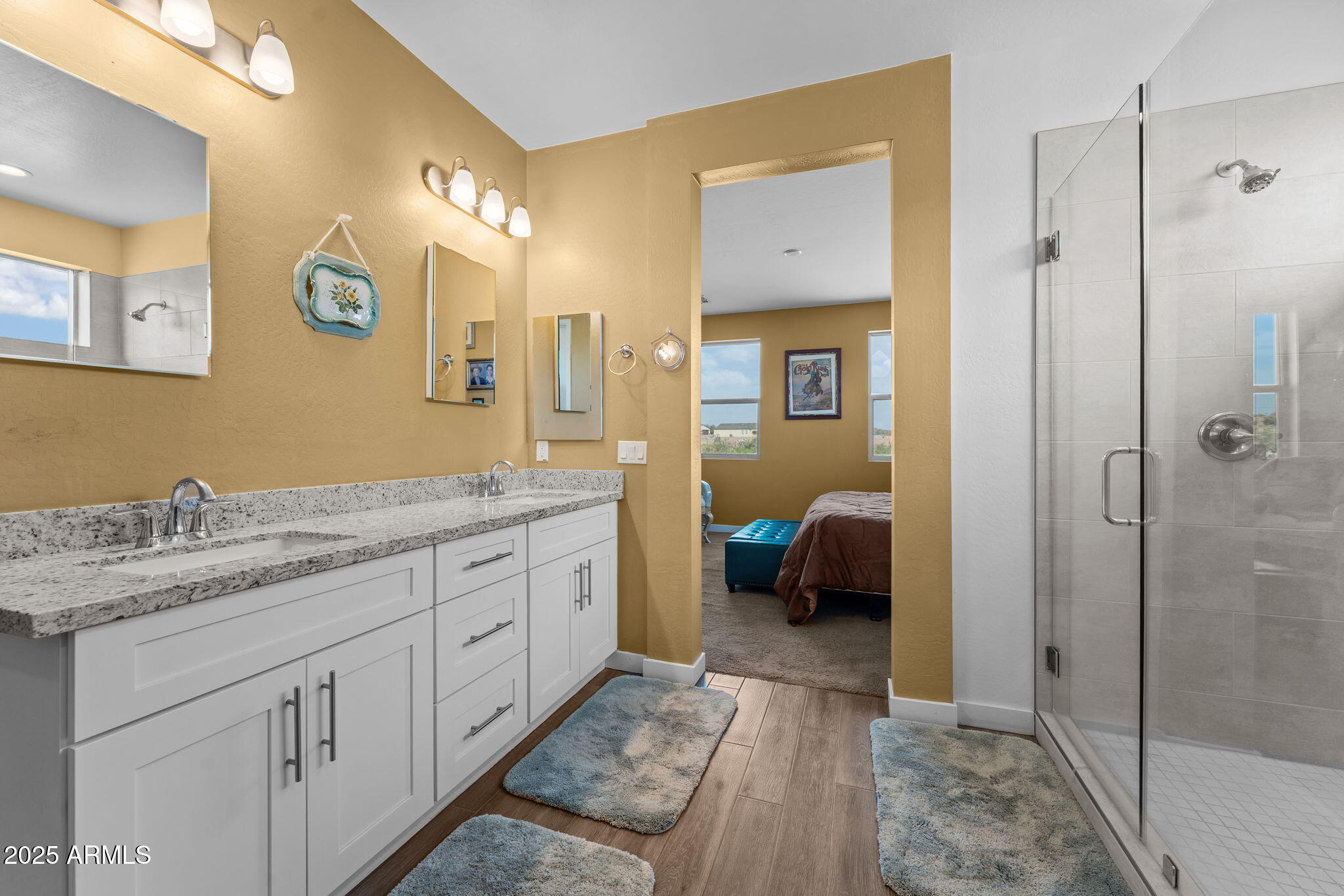 1900 West Ringo Road Wickenburg, AZ 85390 - Photo 18 of 37 a spacious bathroom with a granite countertop sink mirror and shower